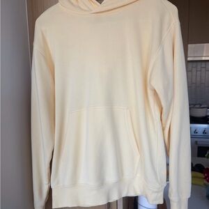 TNA AiryAF Fleece in butter yellow size S